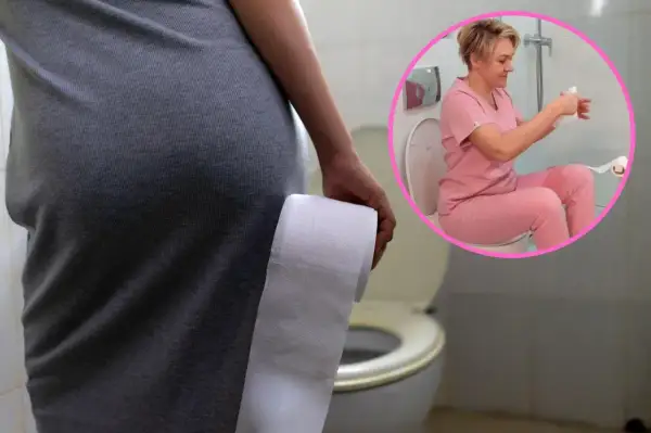 Kobieta w ciąży trzyma papier toaletowy, przygotowując się na kłopoty z wypróżnianiem po porodzie. W okręgu pielęgniarka siedzi na toalecie.